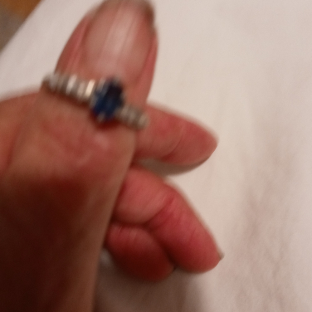 Sapphire on platninum with diamonds